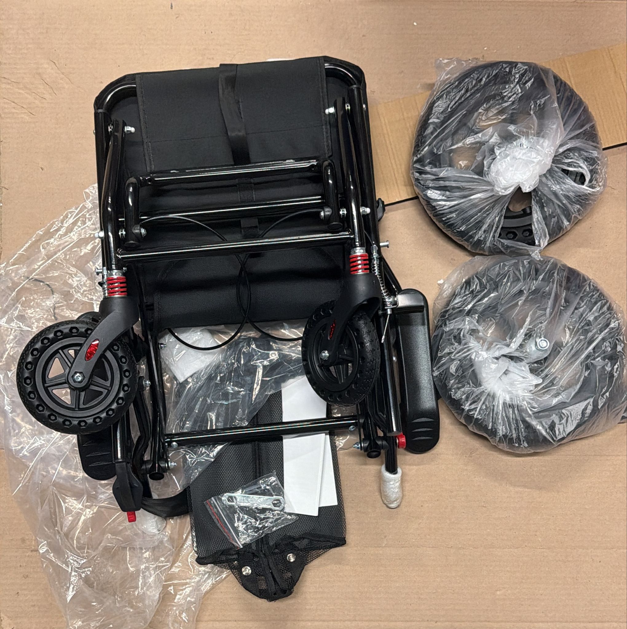 KT THERMO portable aluminum transport wheelchair with string bag and locking hand brakes