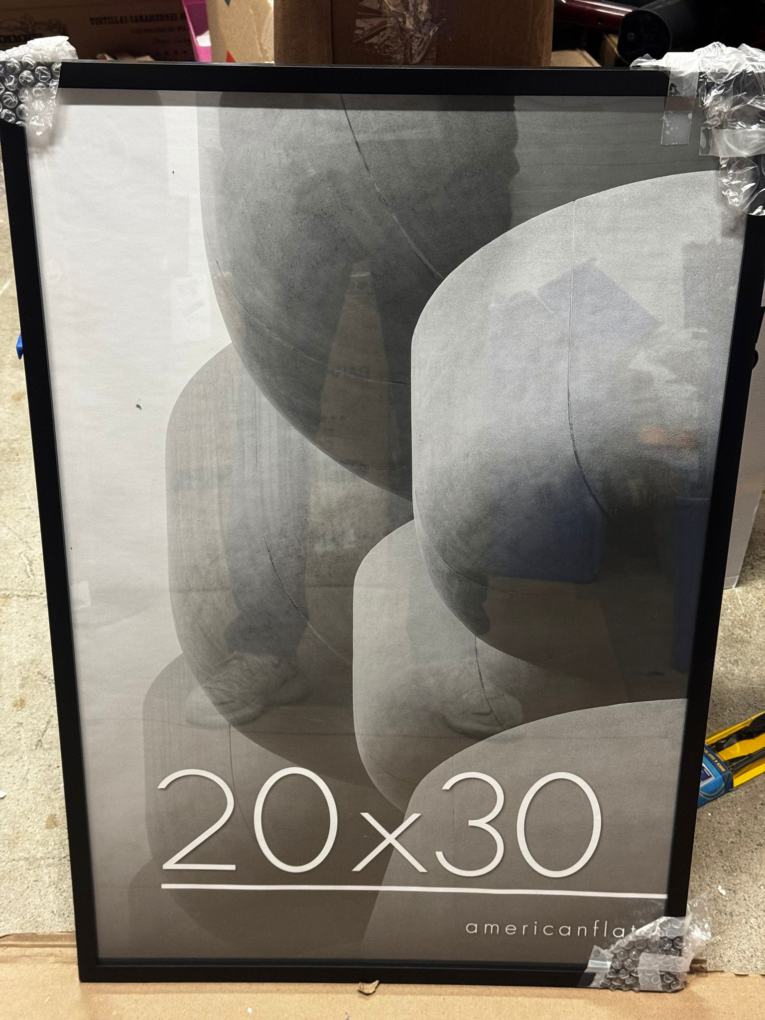 Americanflat 20x30 poster frame with polished plexiglass in black for wall display