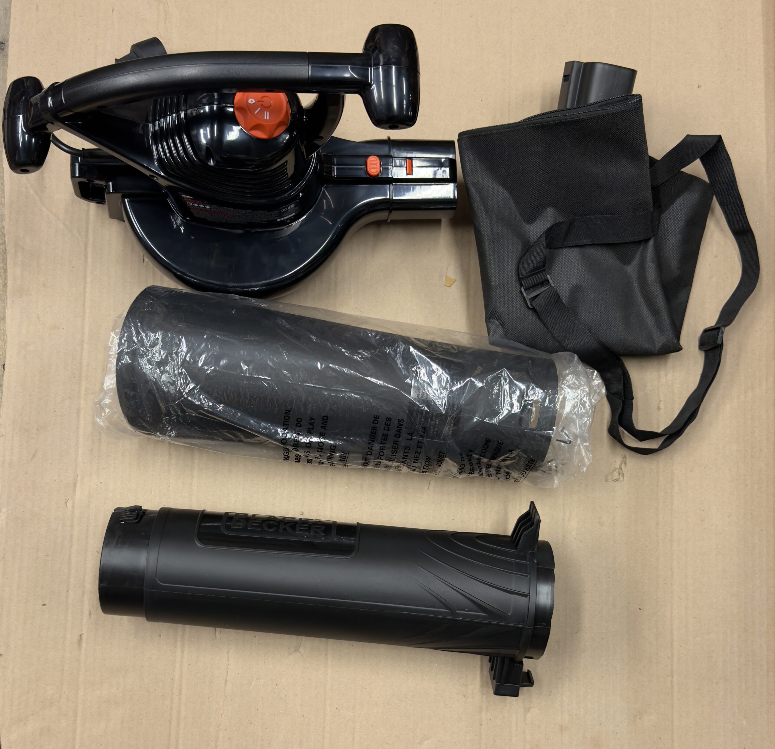 BLACK+DECKER electric leaf blower in black and orange for yard cleaning