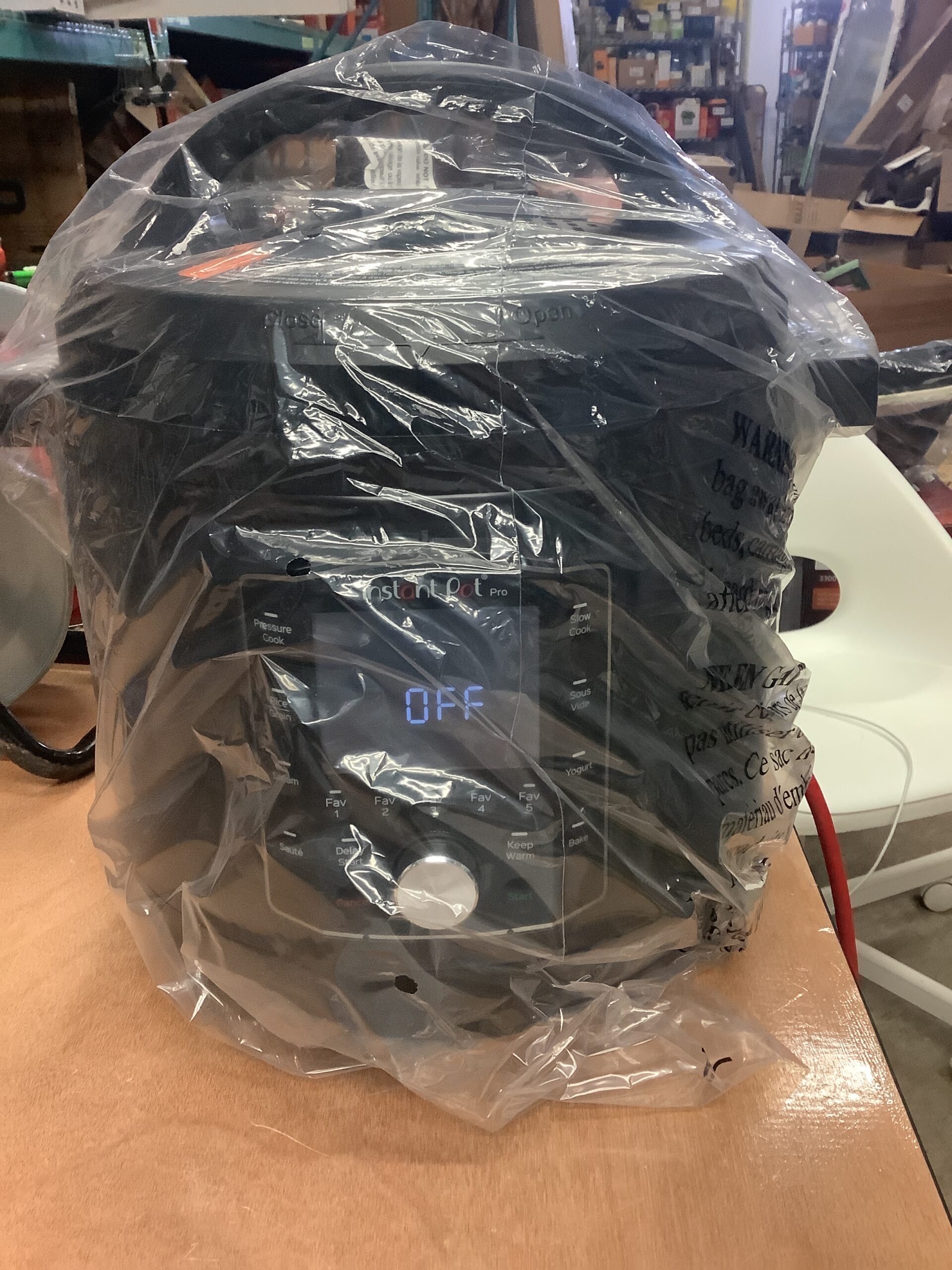 Instant Pot pressure cooker steamer in sleek black finish