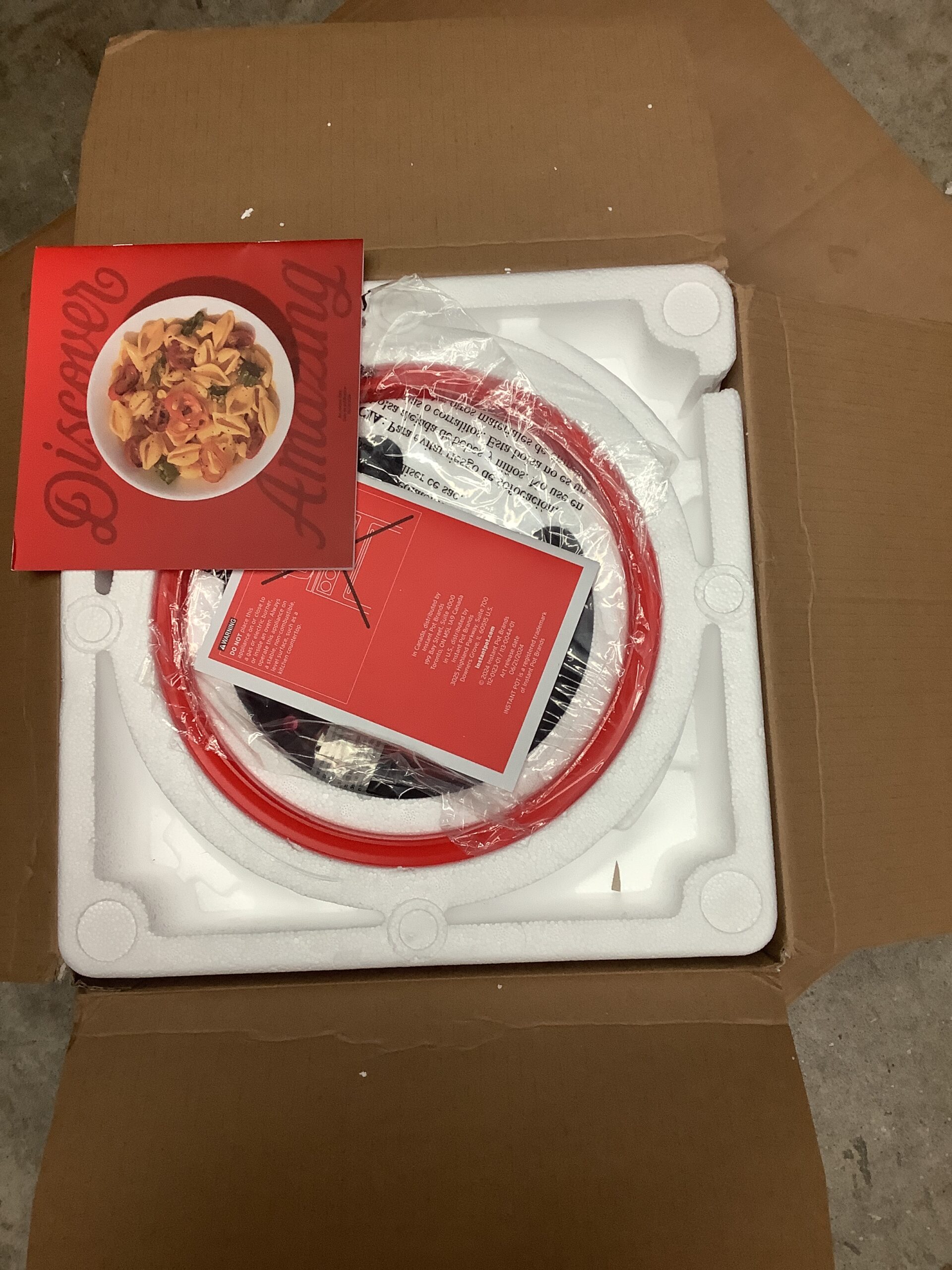 Instant Pot pressure cooker steamer in sleek black finish