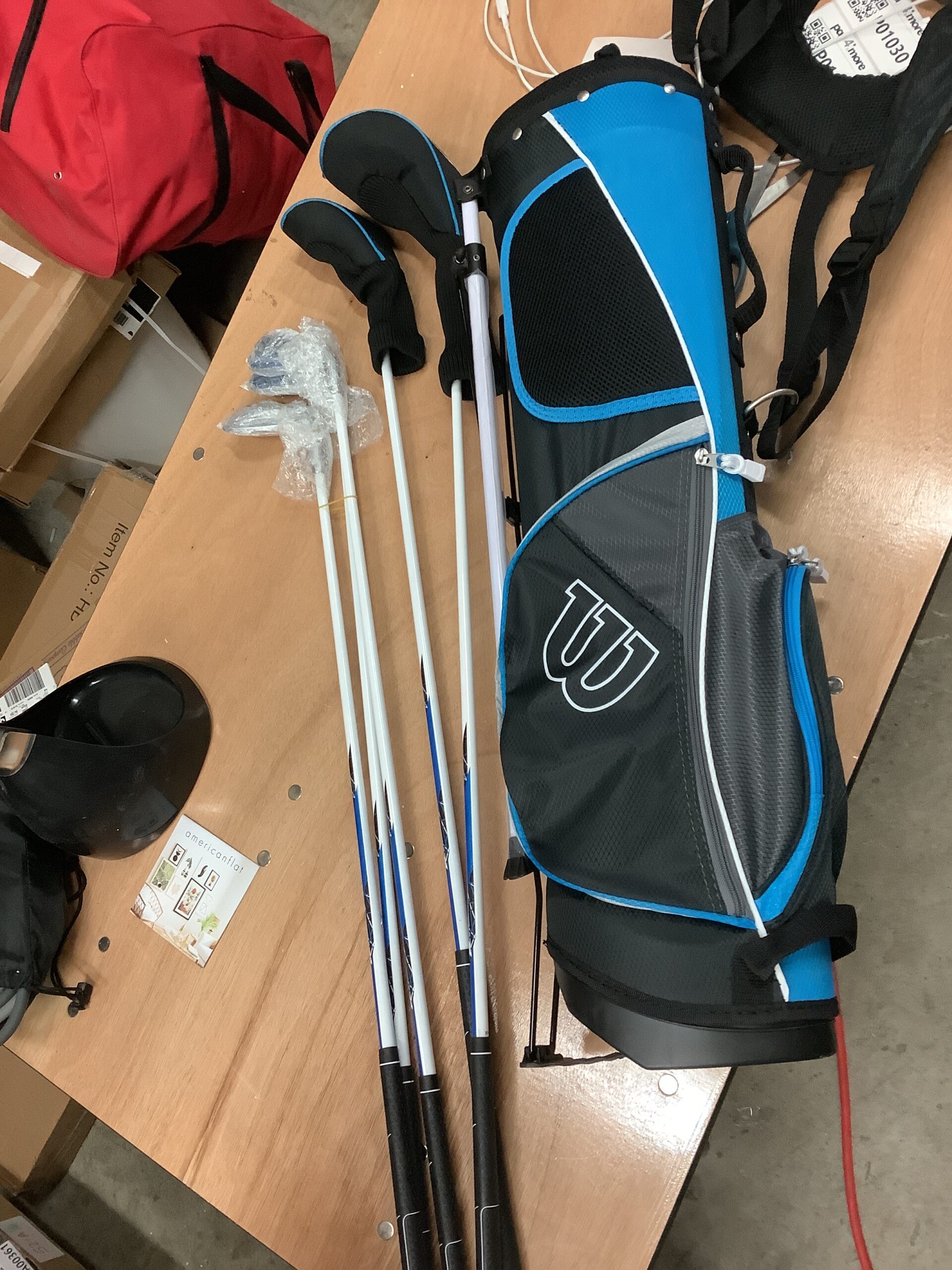 Wilson junior complete golf set in teal with premium carry bag