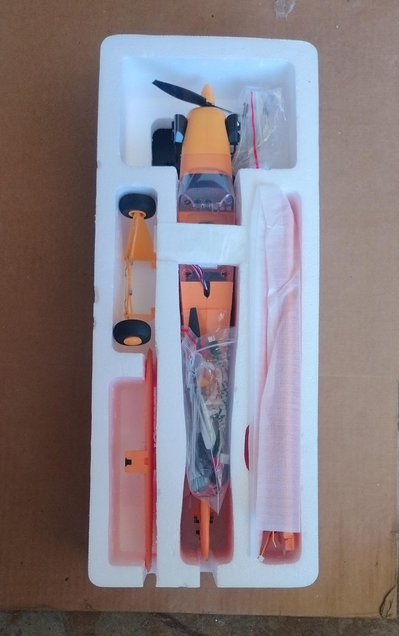 Ckyschn rc plane in sleek white and orange design