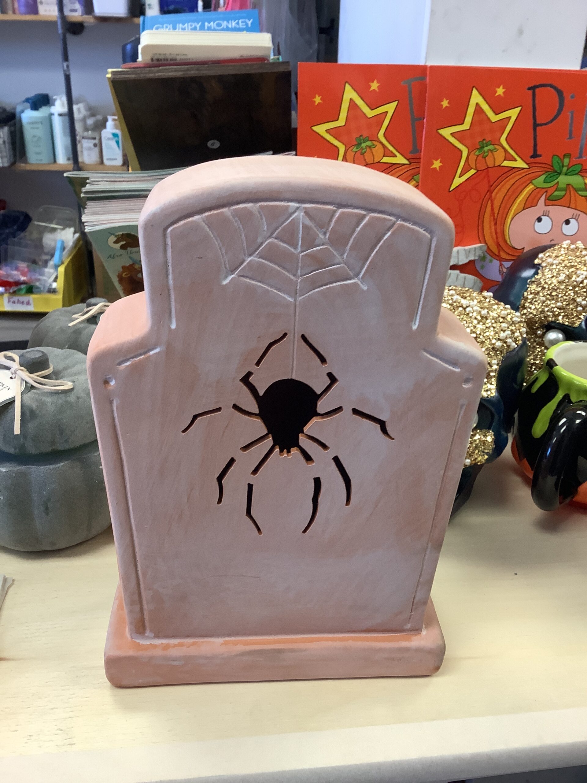 Hyde & EEK! terracotta tombstone spider in classic graveyard style