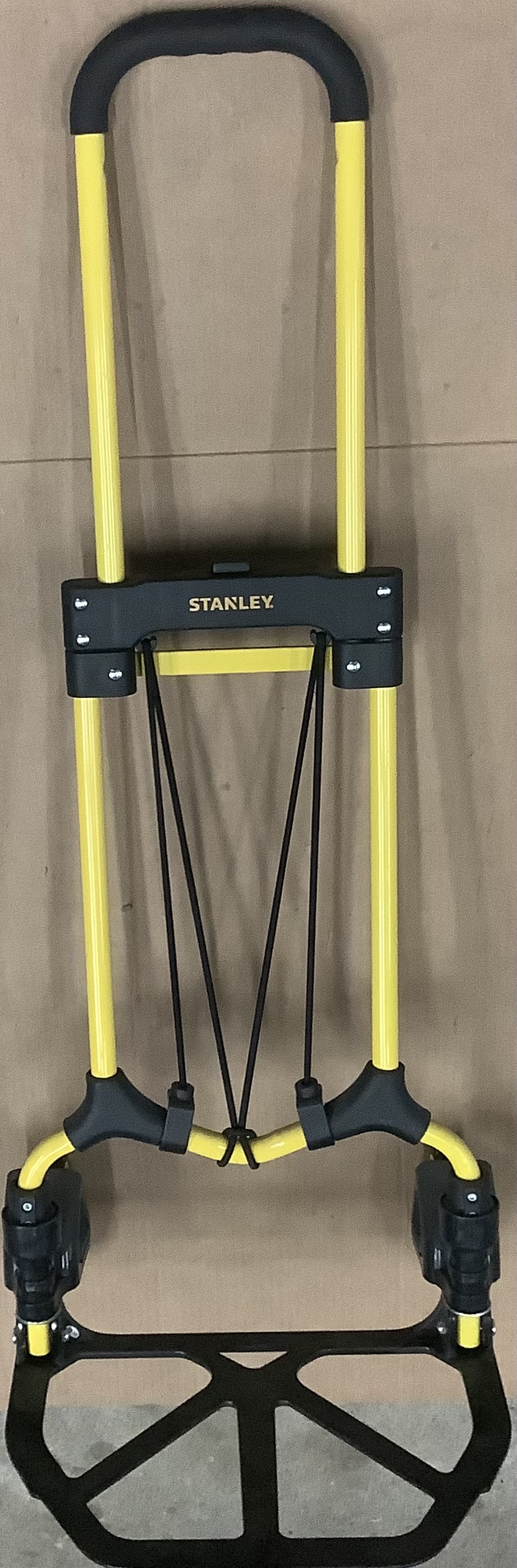 Stanley folding hand truck in bright yellow foldable style