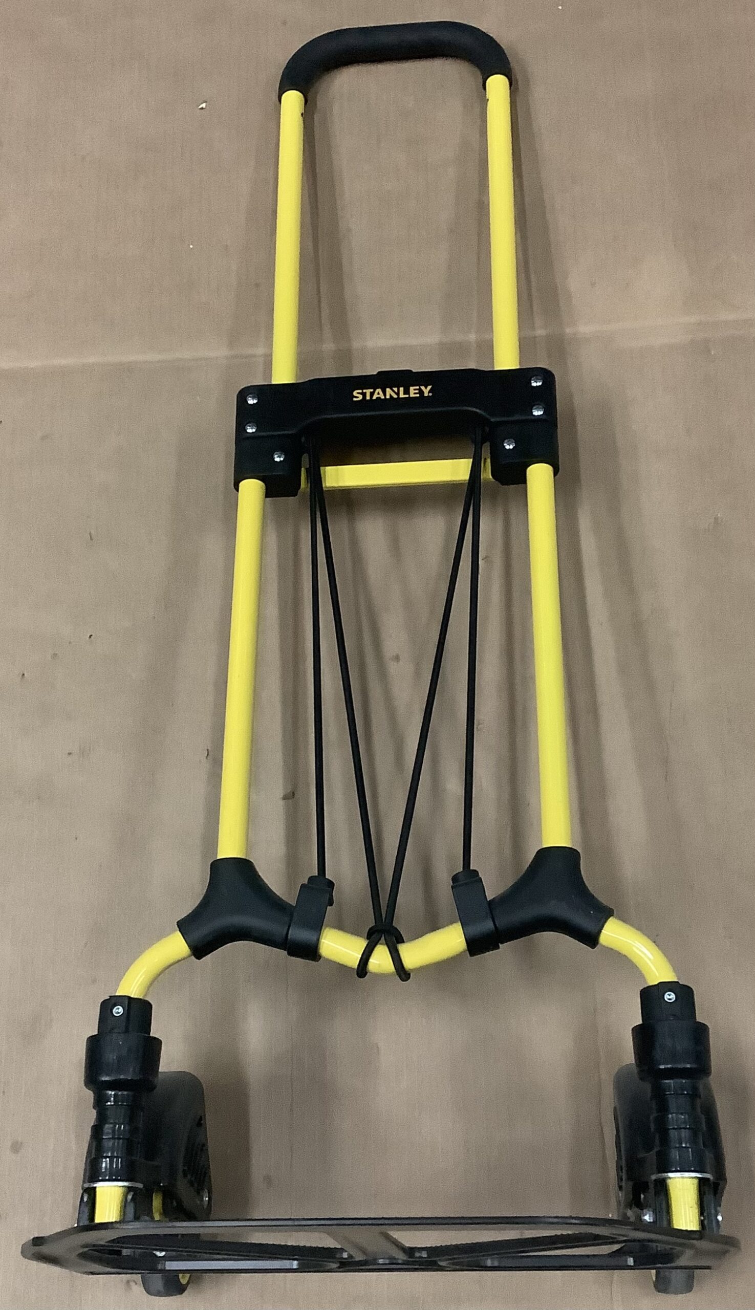 Stanley folding hand truck in bright yellow foldable style