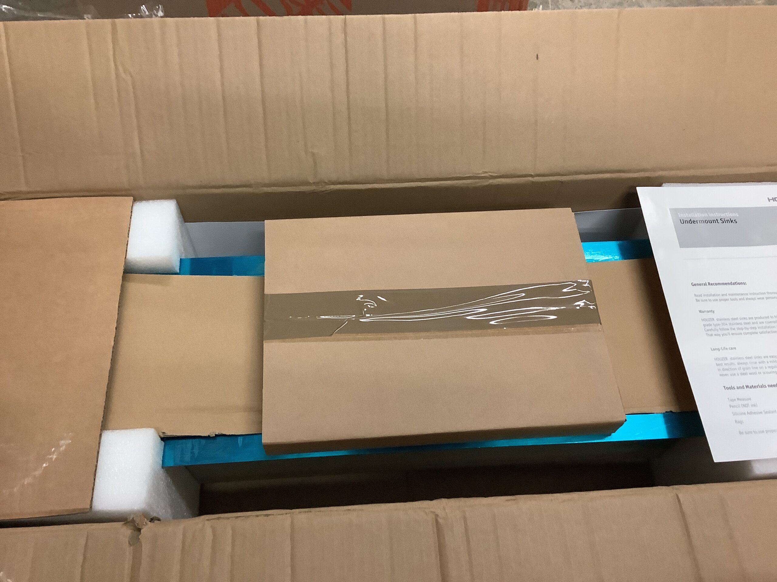 Houzer undermount stainless steel sink in sleek stainless finish