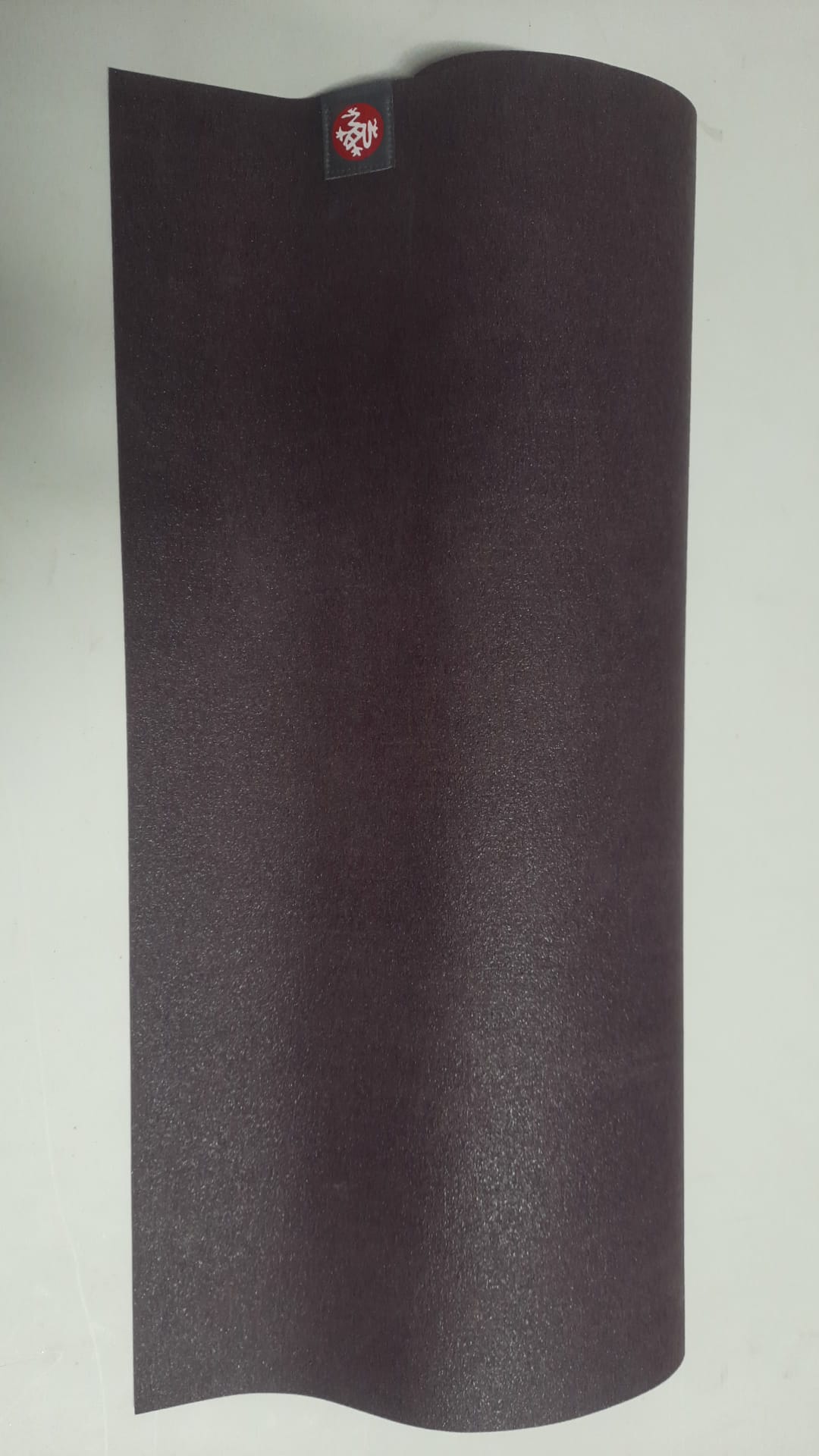 Manduka travel yoga mat in acai colour, 1.5mm thick and 71 inches long
