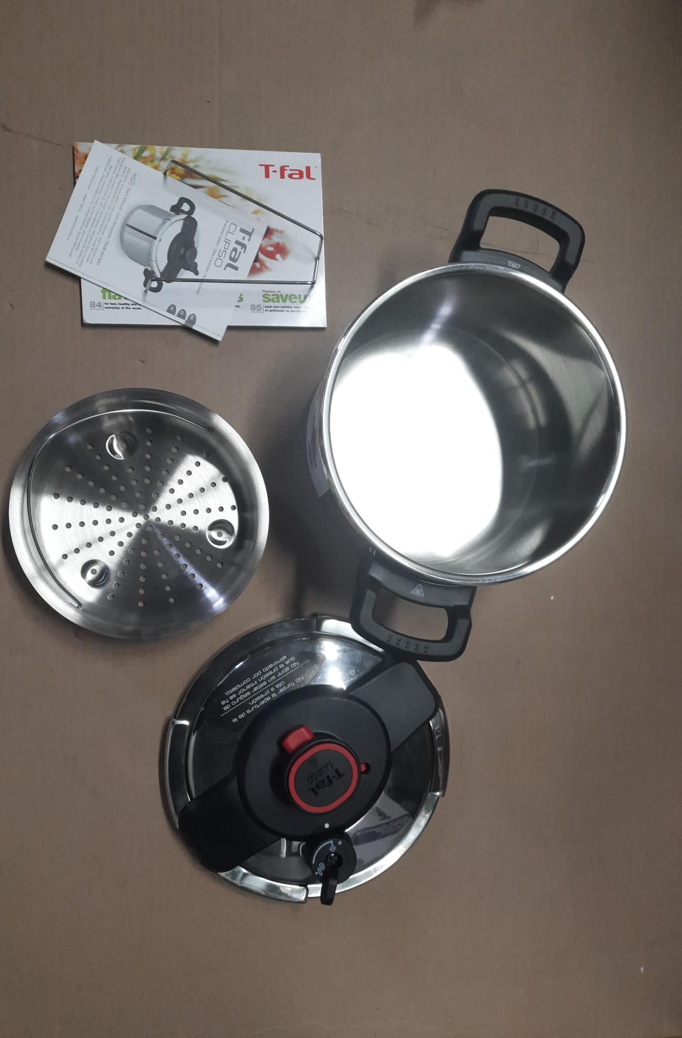 T-fal pressure cooker in stainless steel with secure locking system