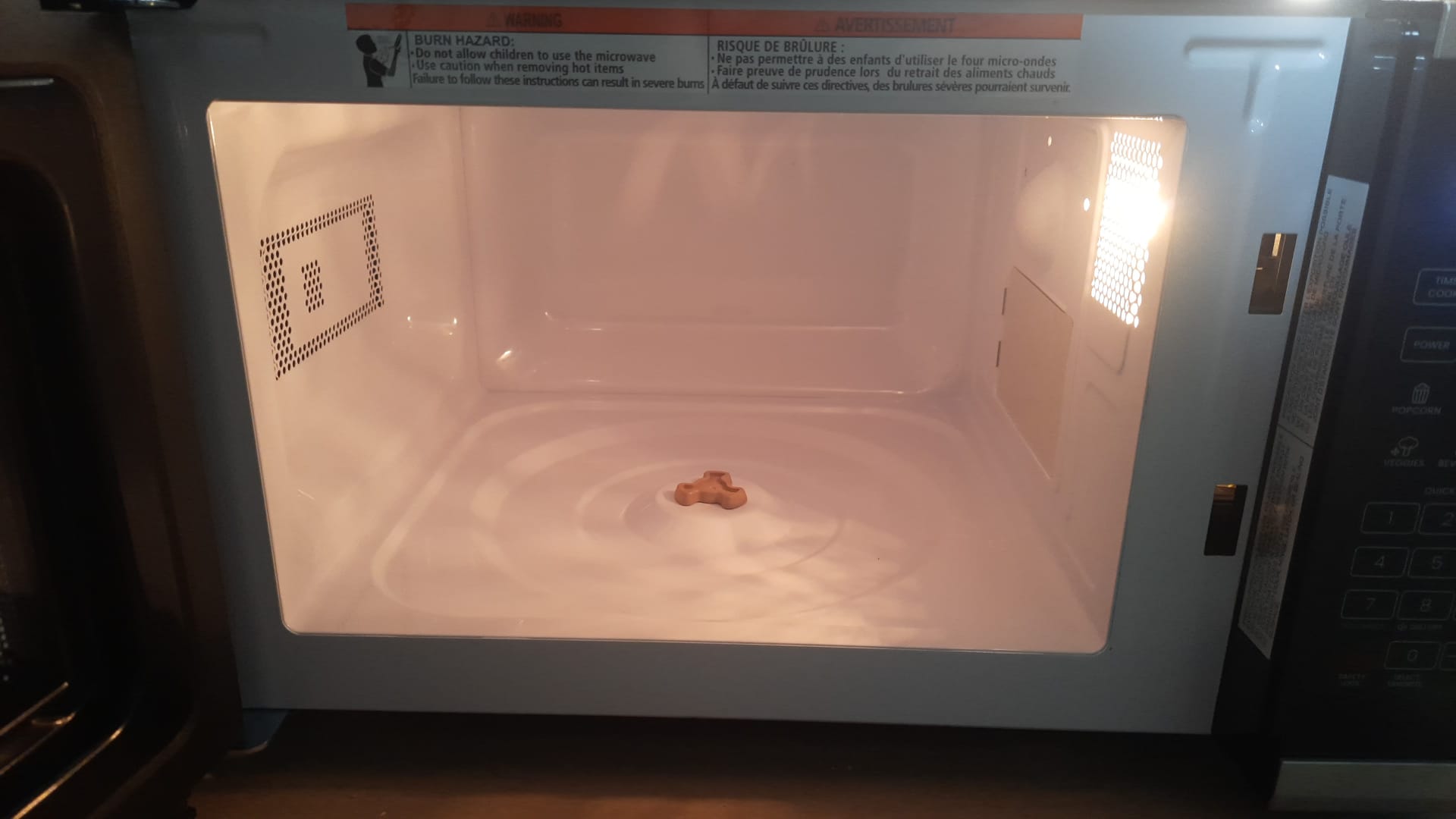 Chefman countertop microwave oven in stainless steel with digital controls