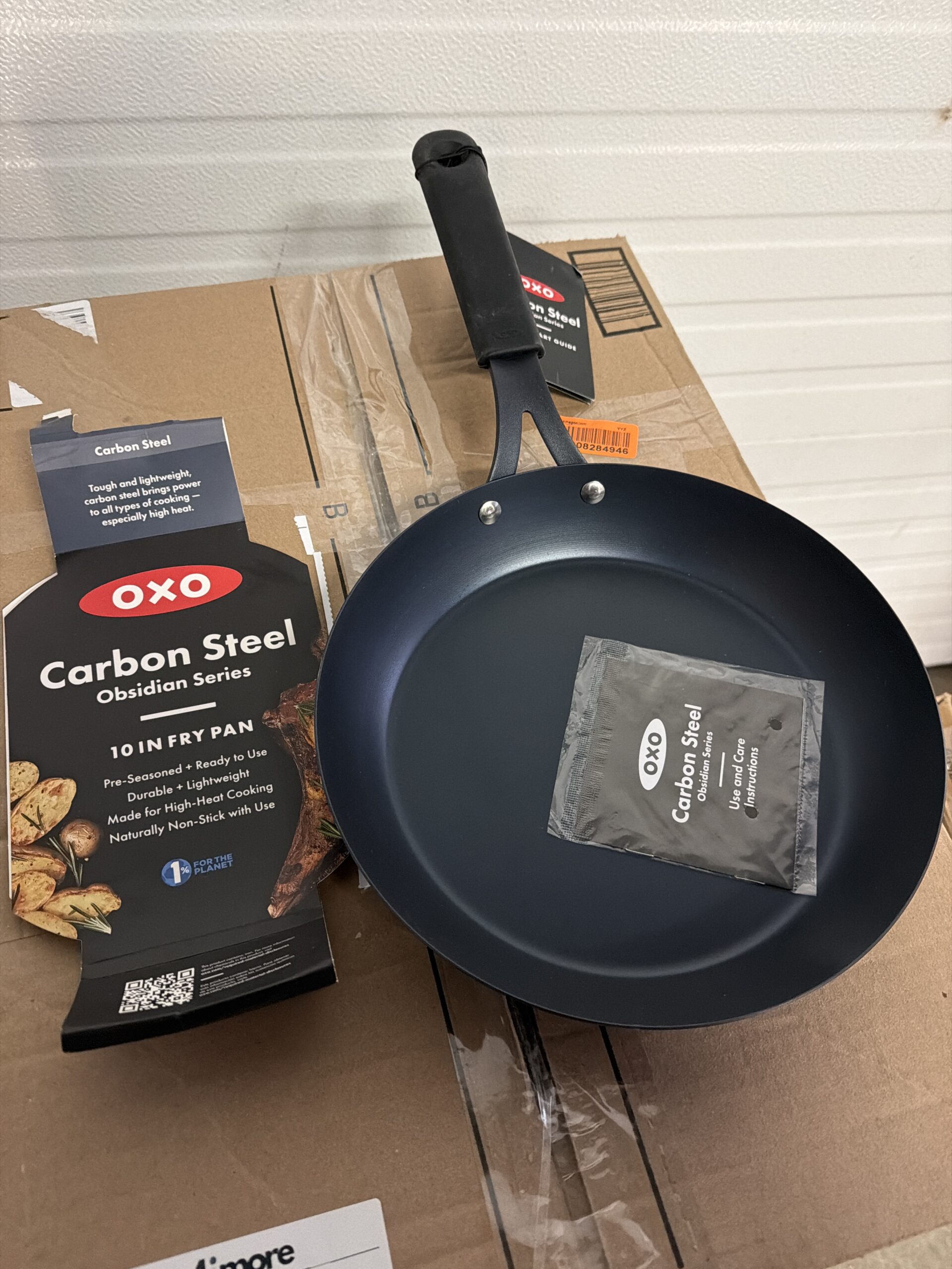 OXO carbon steel frying pan in black with removable silicone handle