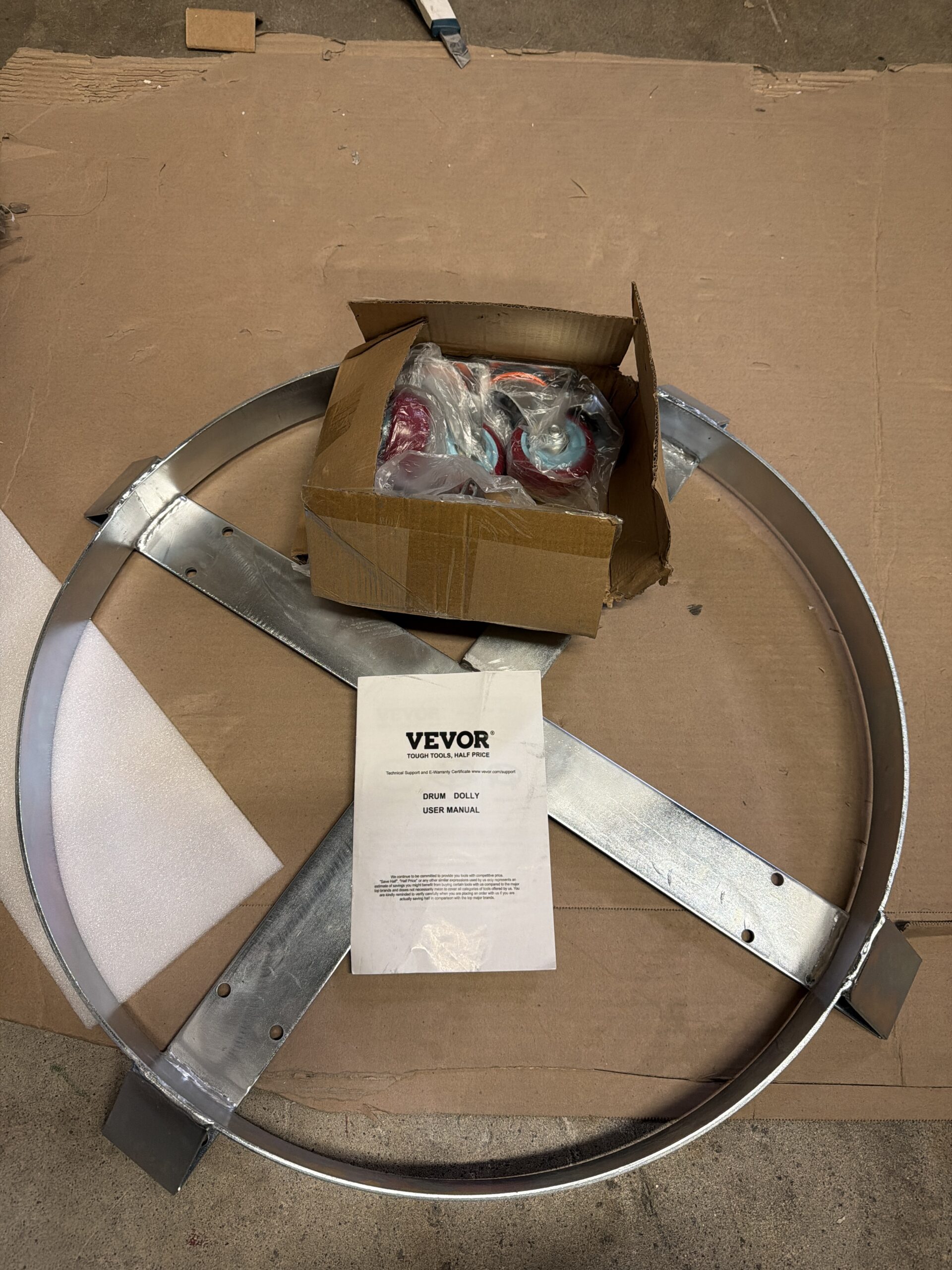 VEVOR 55 gallon drum dolly with steel frame and swivel casters