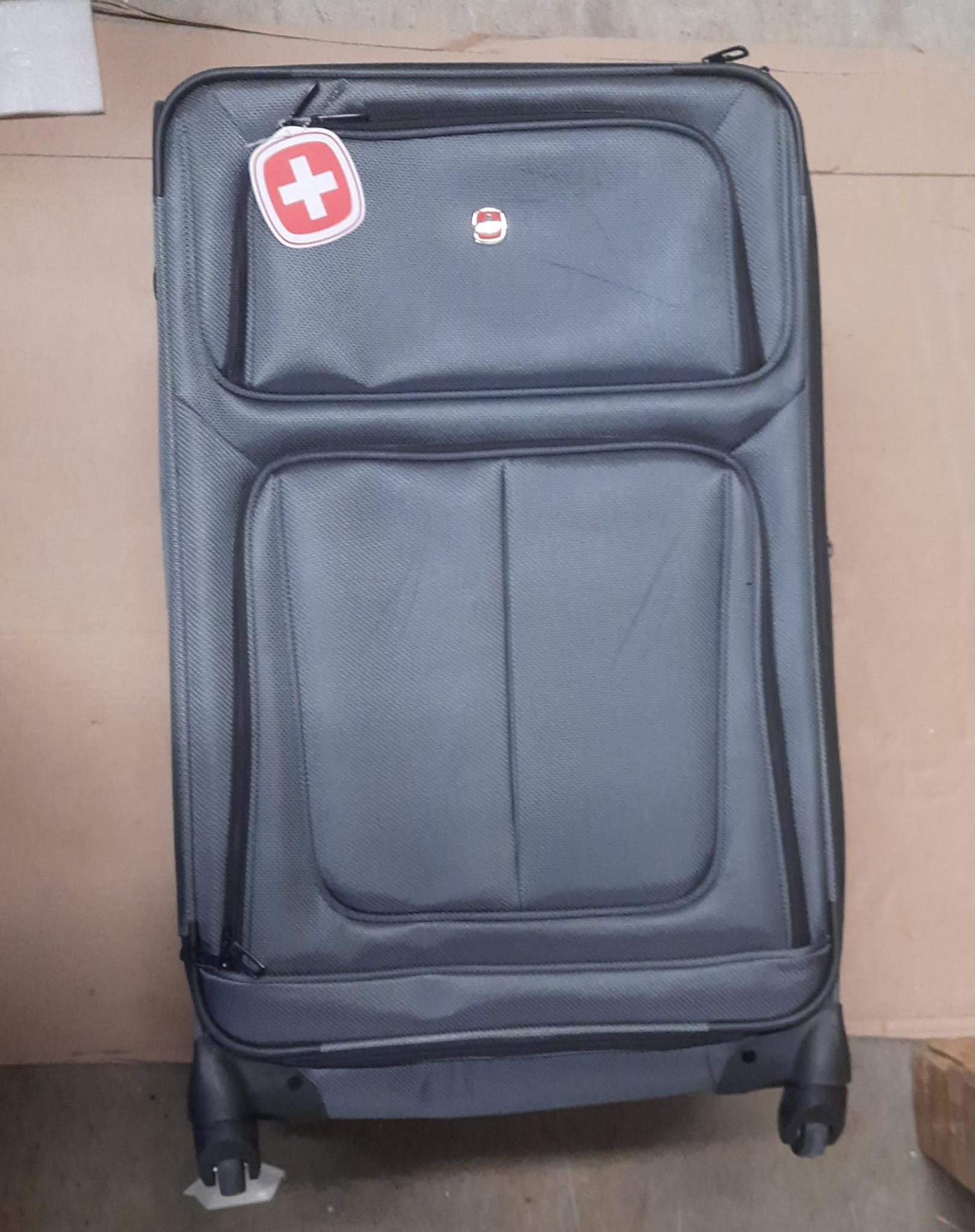 SwissGear softside expandable luggage in dark grey with spinner wheels