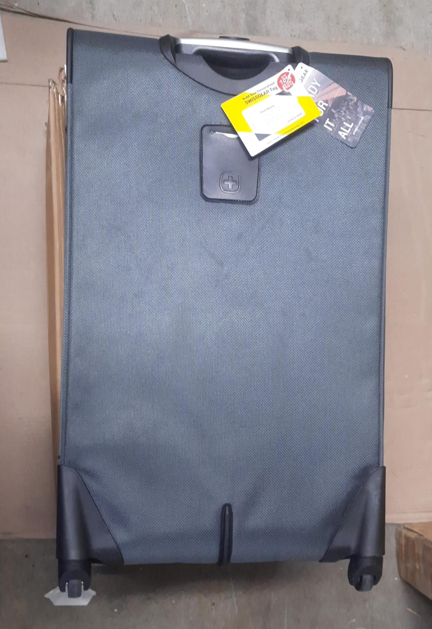 SwissGear softside expandable luggage in dark grey with spinner wheels