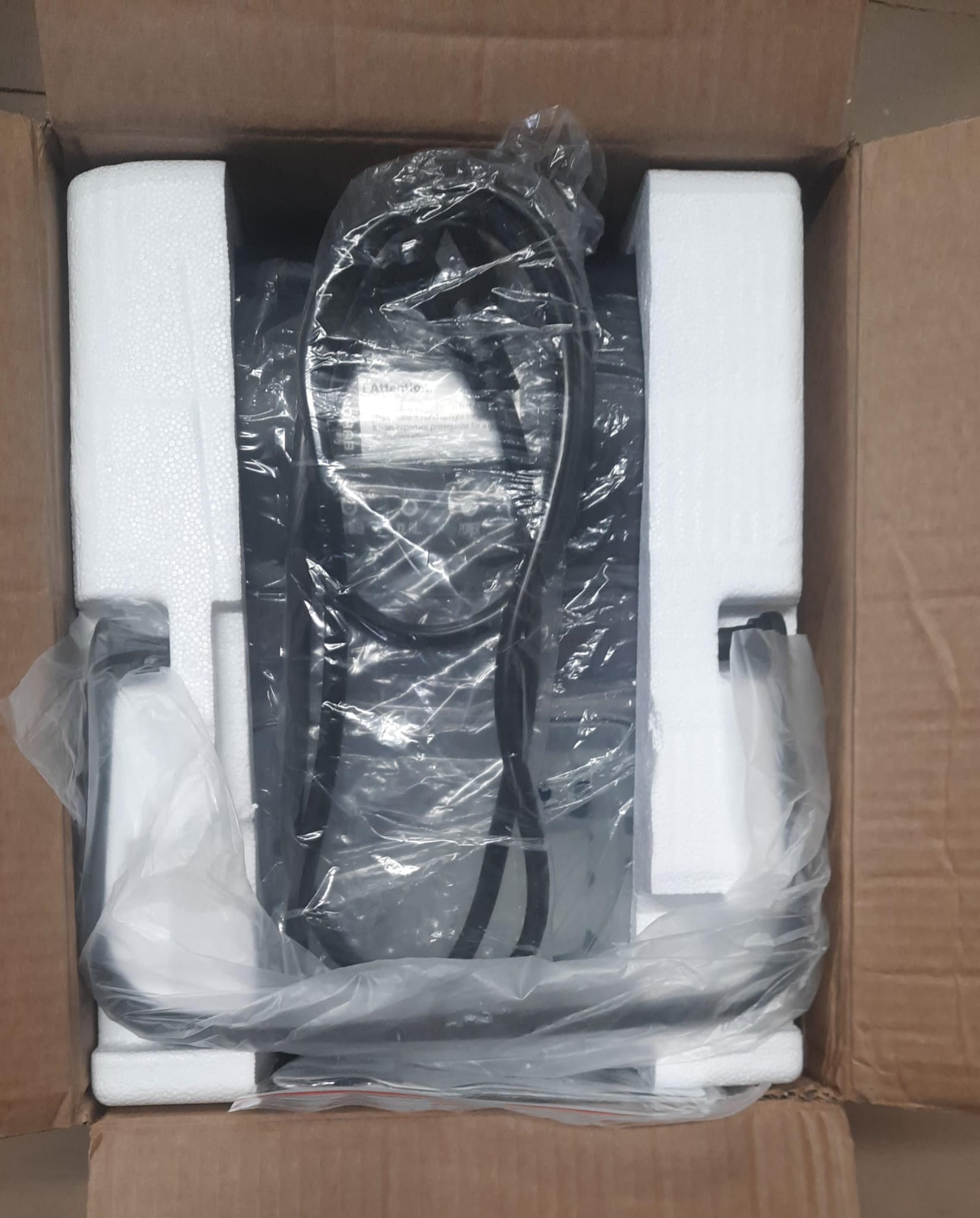 Euhomy countertop ice maker in black with handle and ice basket