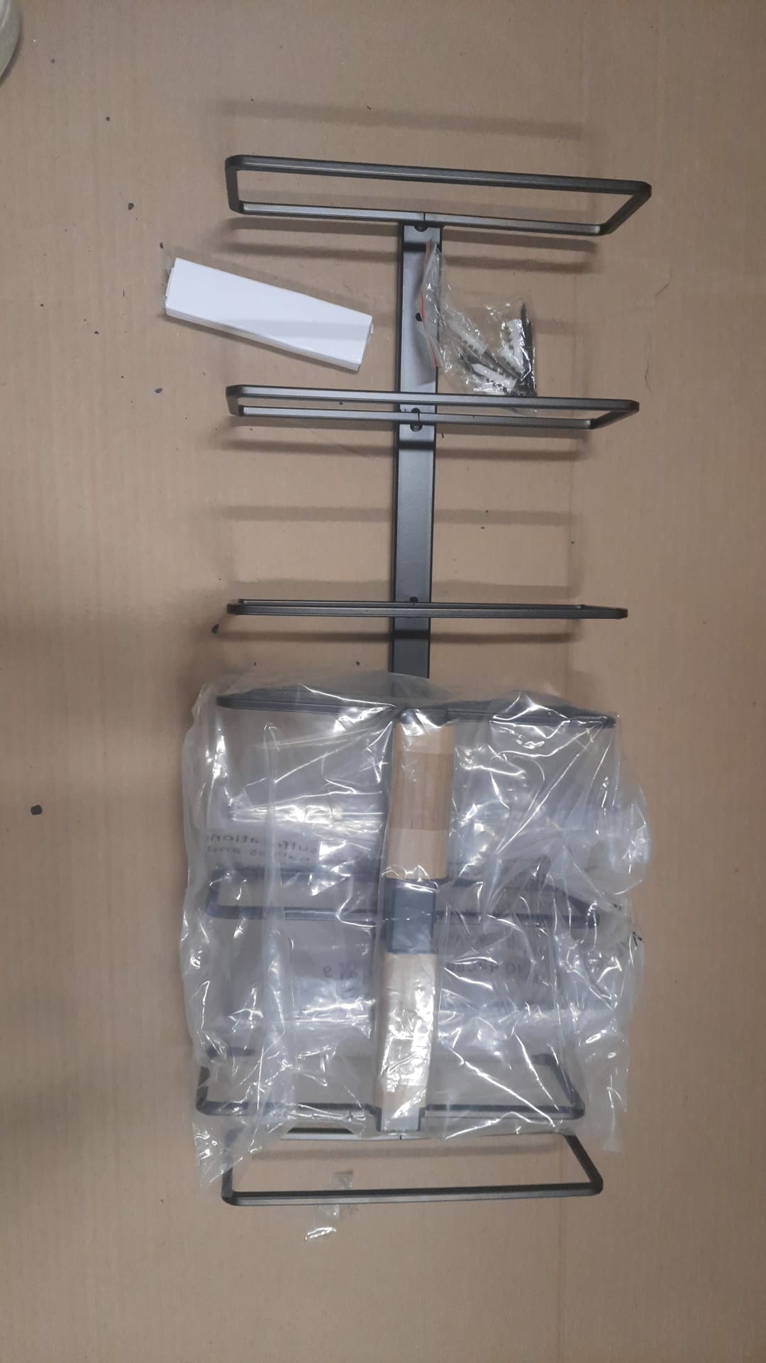 The Rack Co. wall mounted wine rack in satin black holding 9 bottles with free corkscrew opener