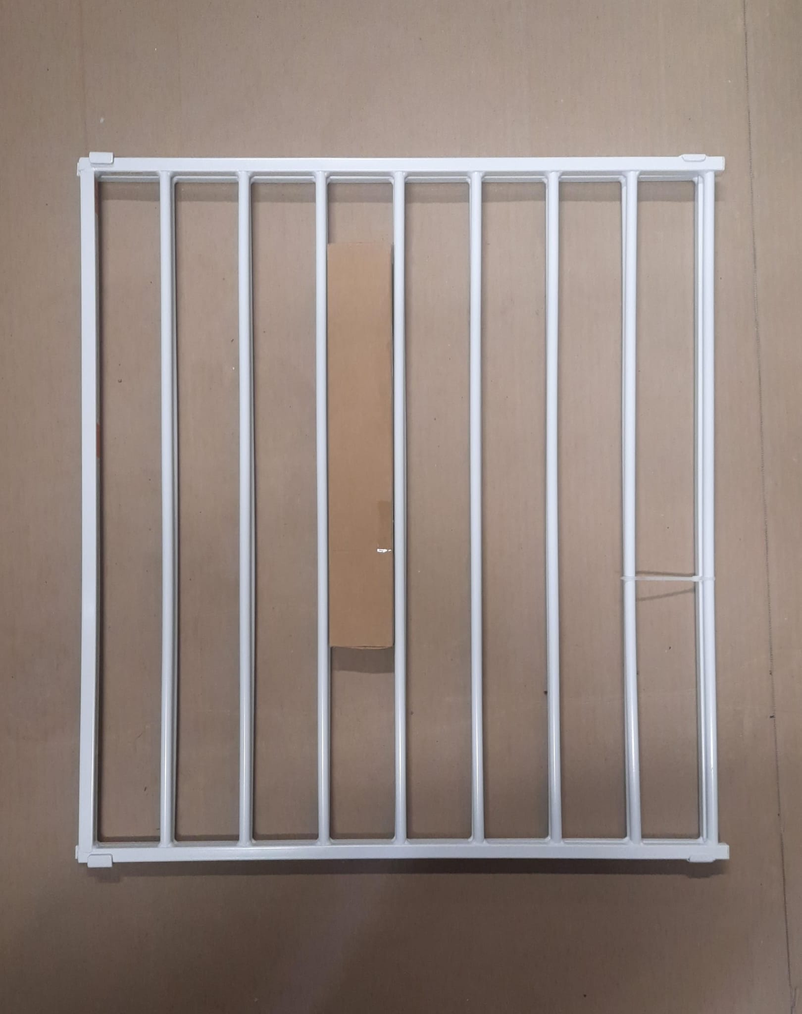 Safety 1st expanding metal gate in white with adjustable width for home safety