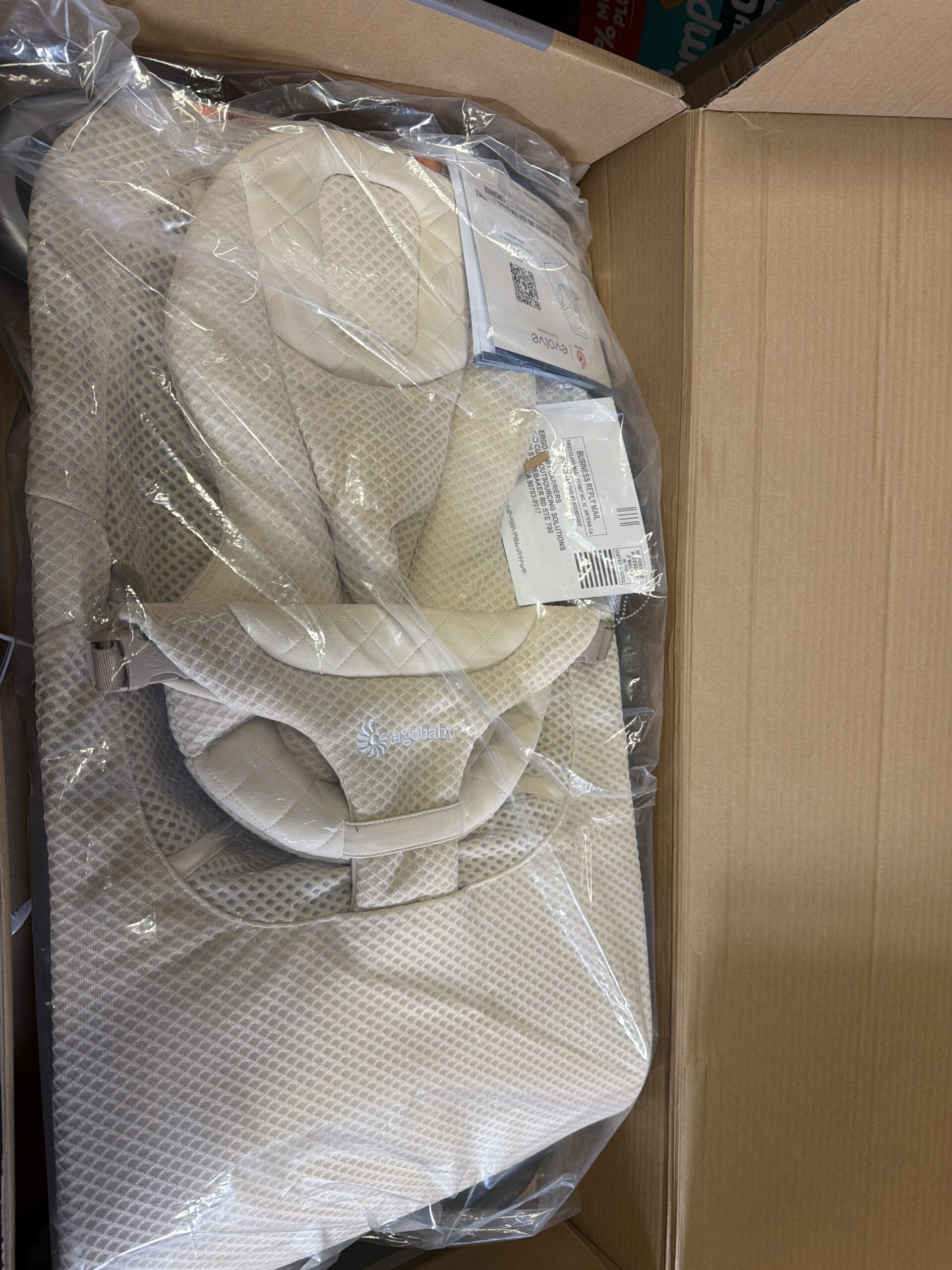 Ergobaby mesh baby bouncer in cream colour for newborns to toddlers