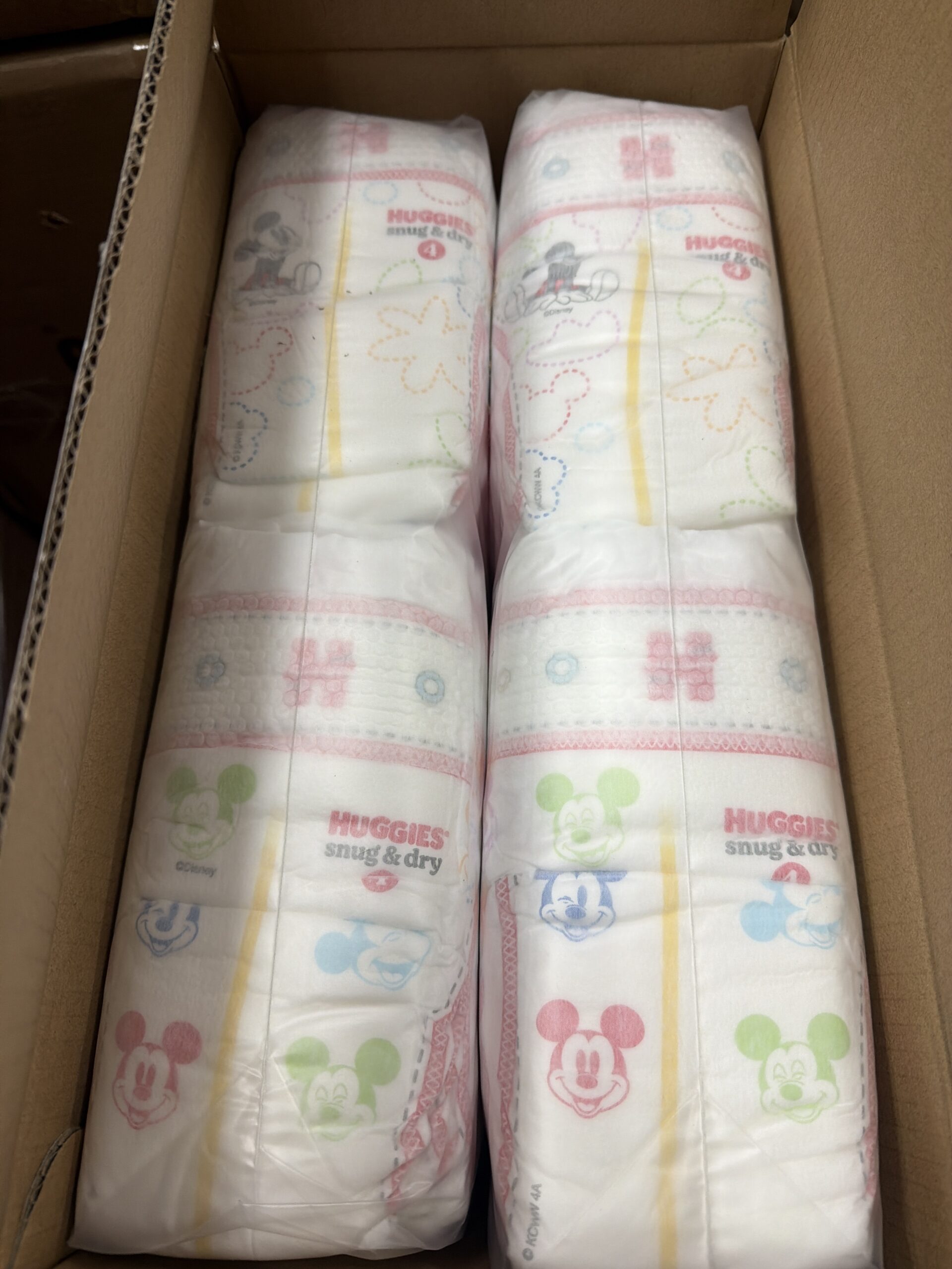 Huggies size 4 diapers in snug and dry packaging, pack of 92