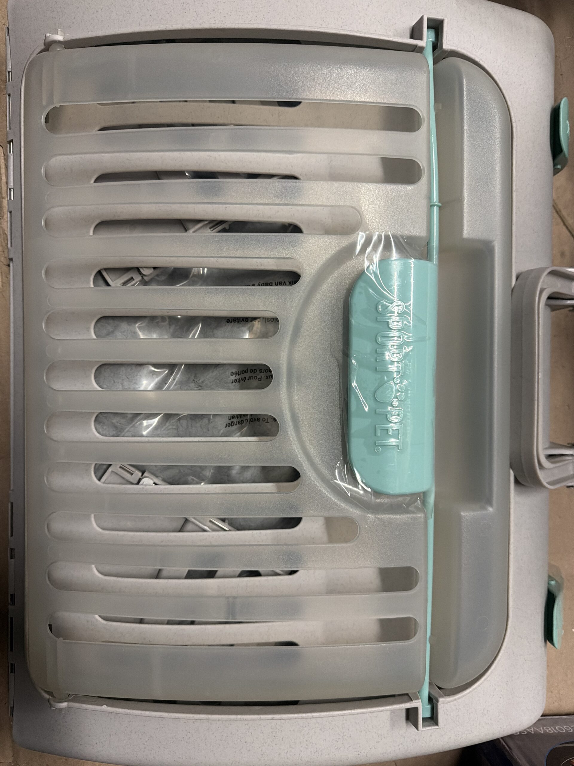 SportPet Designs foldable travel cat carrier in gray with waterproof bed