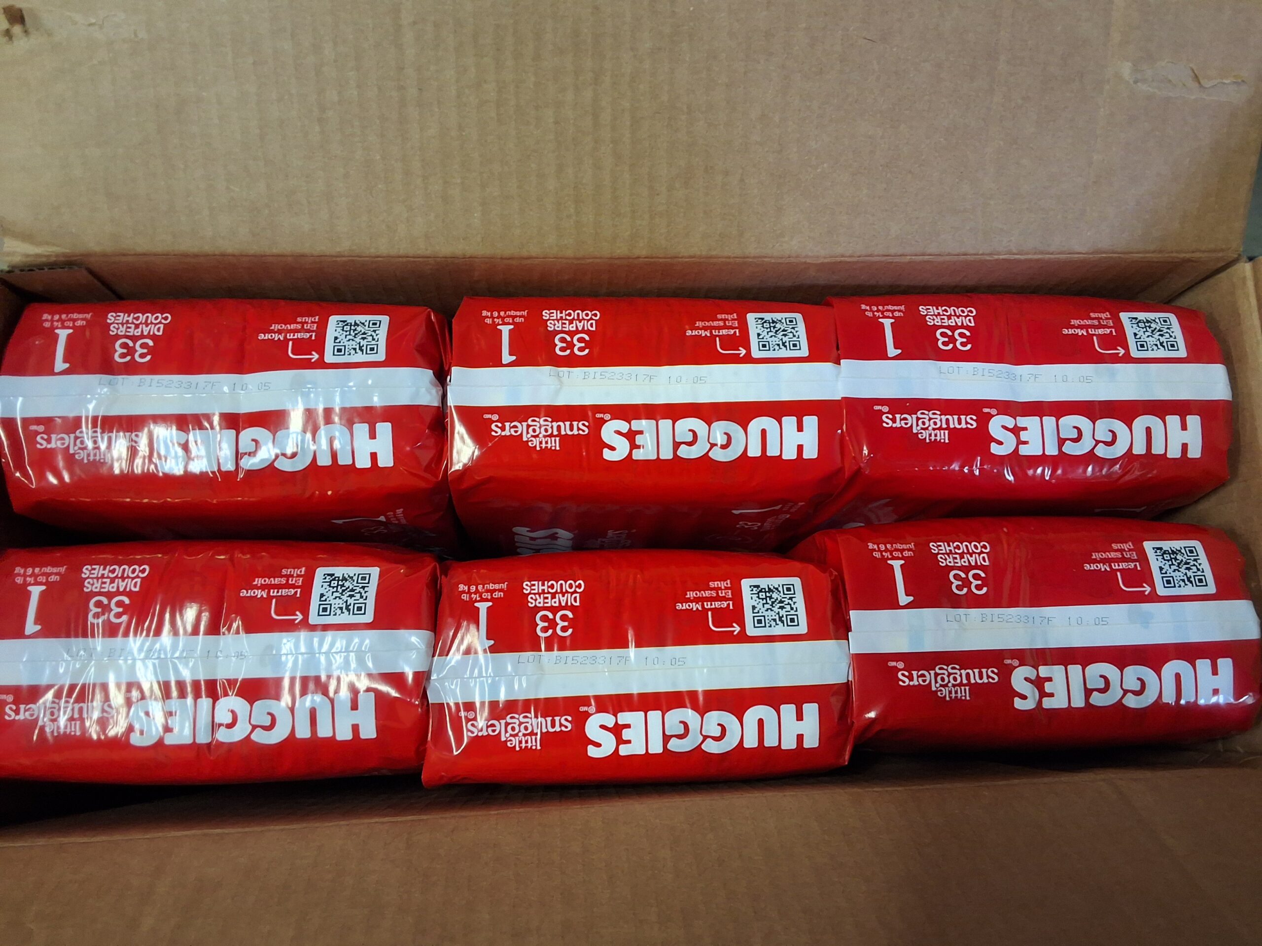 Huggies size 1 diapers package showing 198 count in packaging