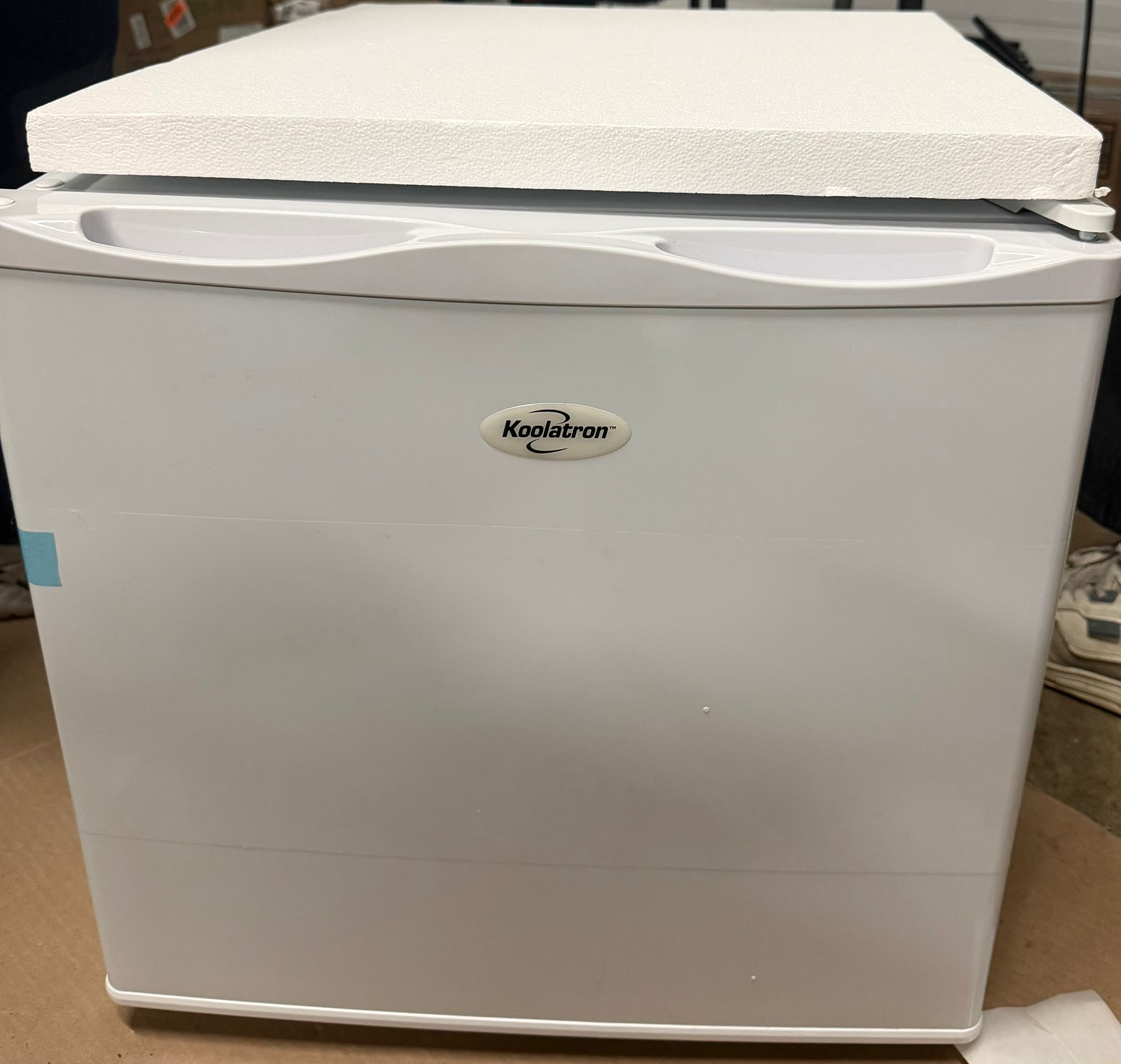 Koolatron mini upright freezer in white, space-saving design