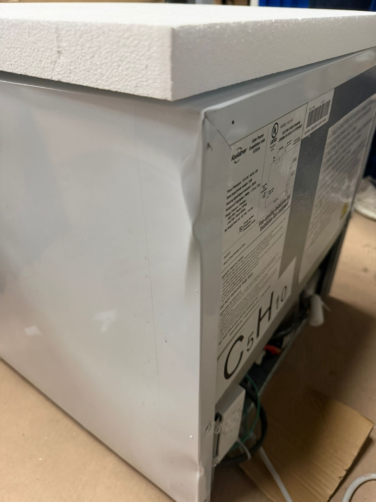 Koolatron mini upright freezer in white, space-saving design