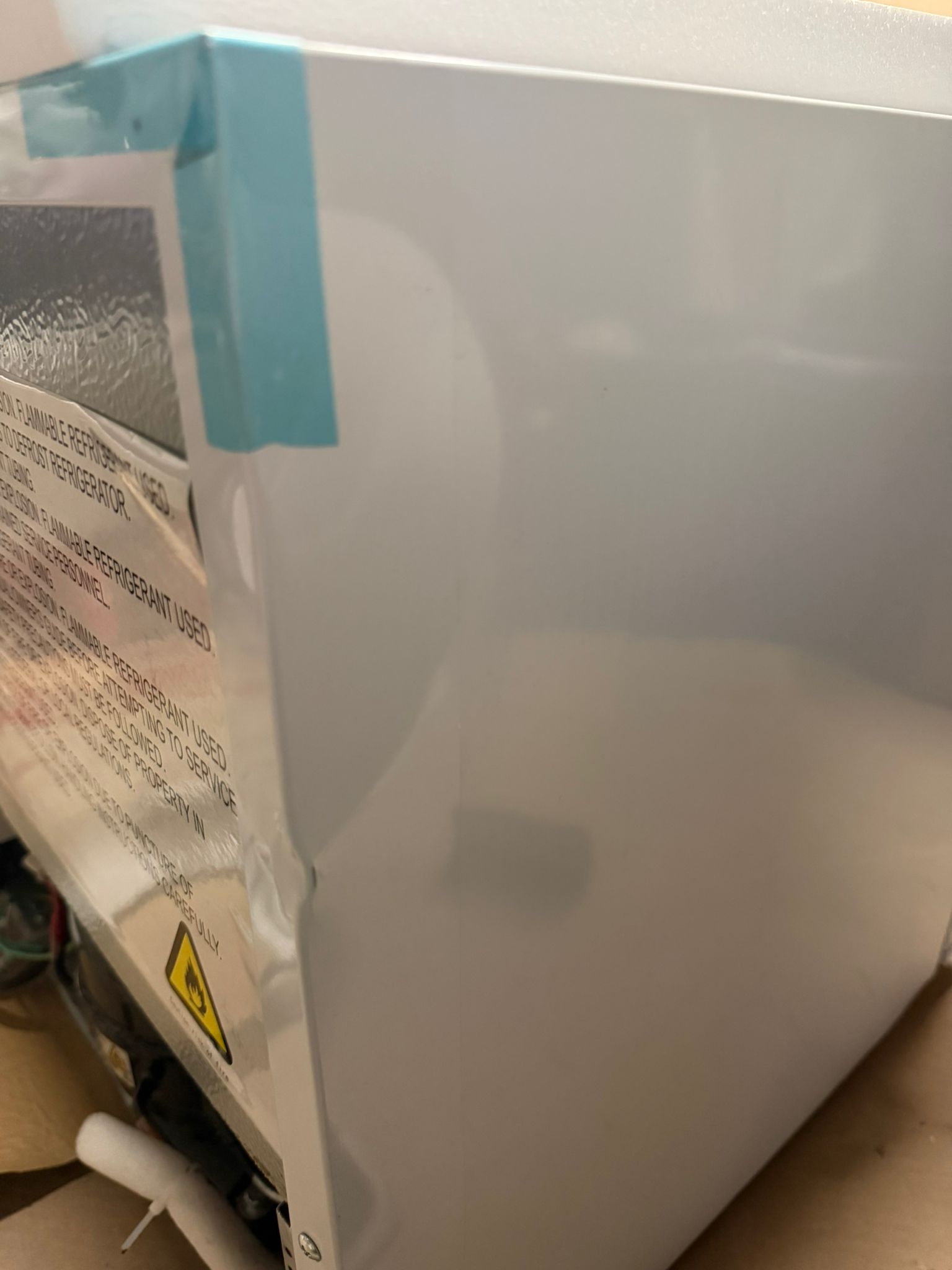 Koolatron mini upright freezer in white, space-saving design