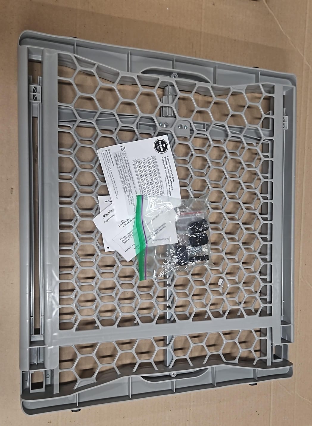 Regalo extra wide baby gate in white plastic pressure-mounted design