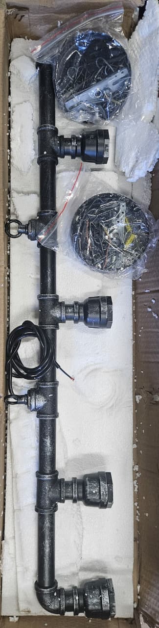 industrial water pipe chandelier in rustic steampunk style