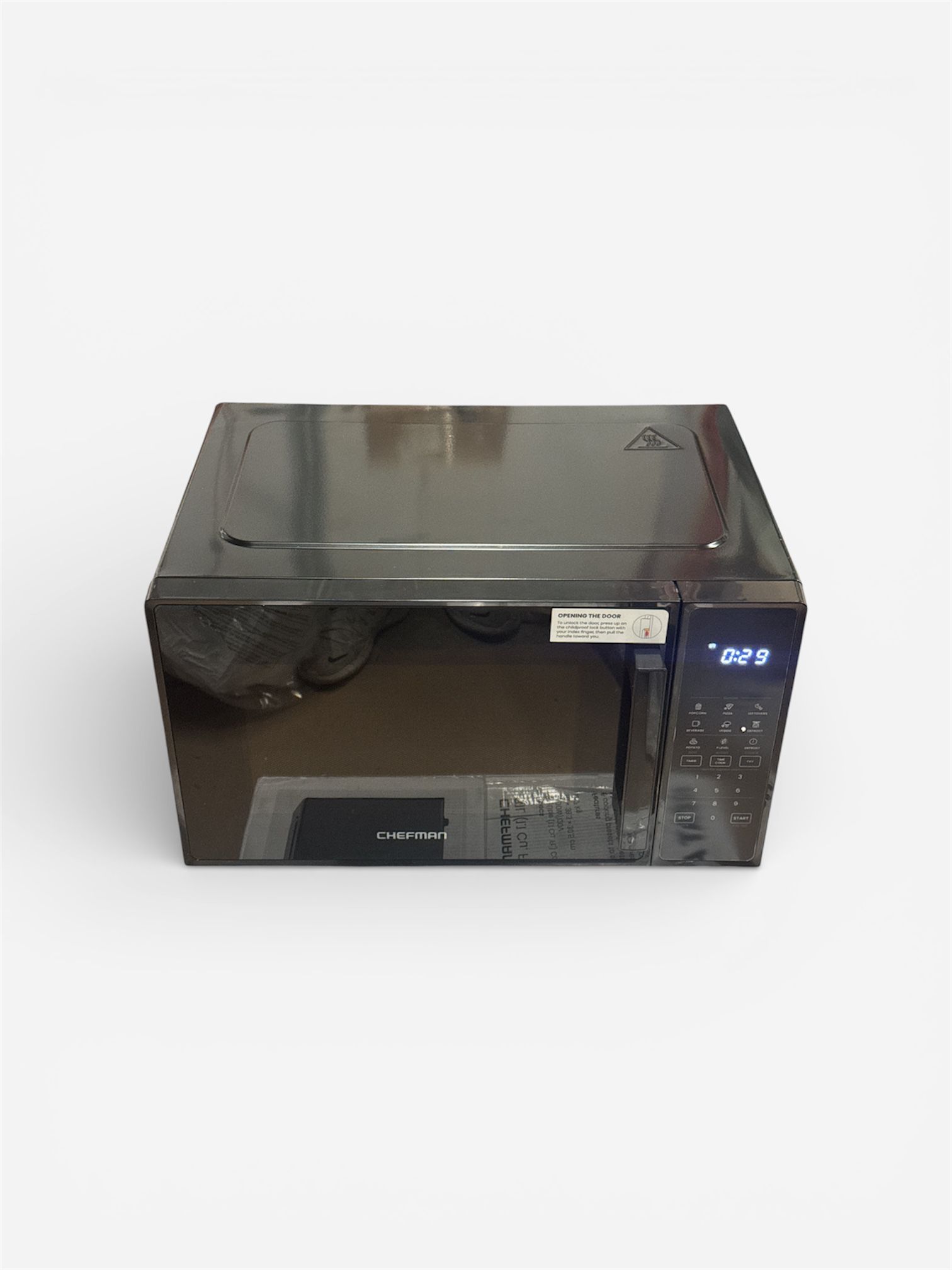 Chefman countertop microwave oven in black with 10 power levels