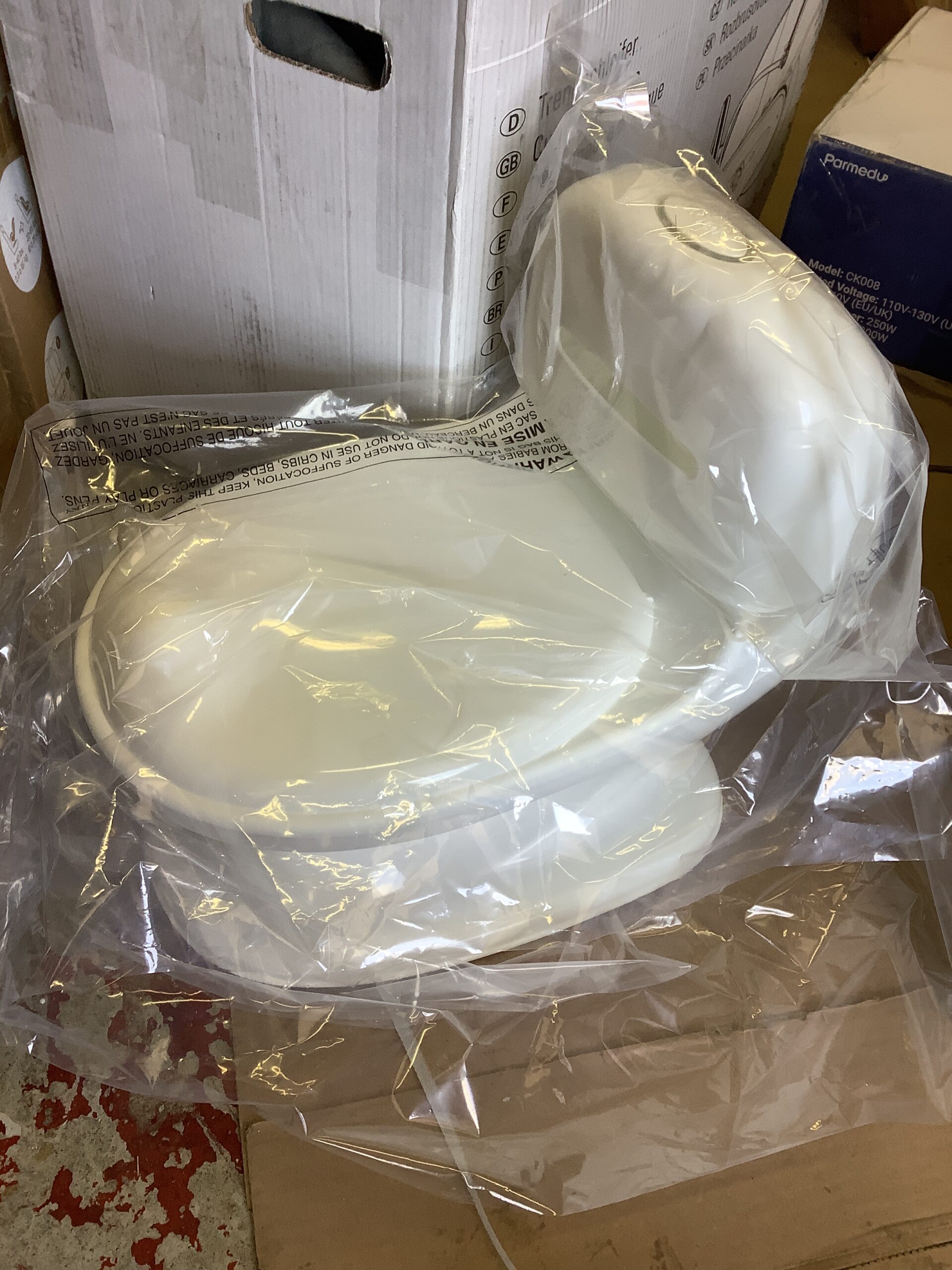 Nuby training potty in bright toddler-friendly design