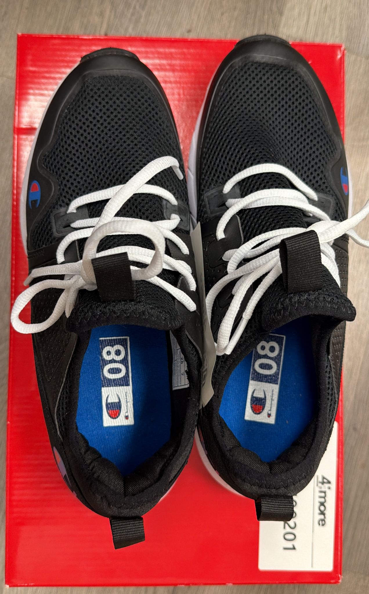 Champion men's running shoes in black with breathable upper